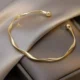 Twisted gold bracelet